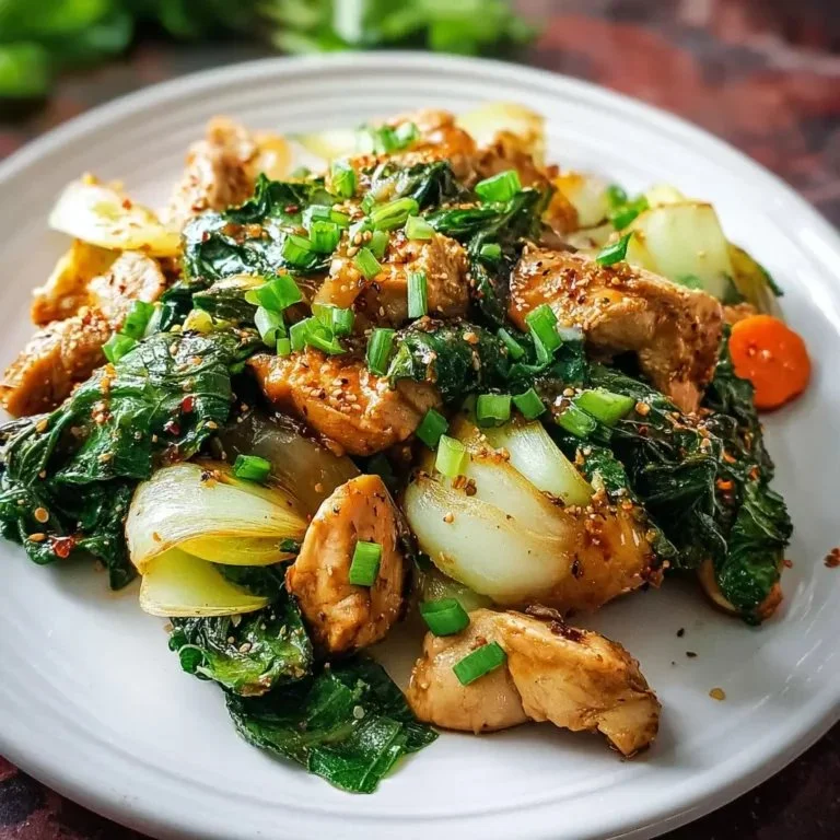 Gluten-free stir-fried chicken with bok choy on a plate