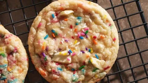 Delicious birthday cake cookies topped with colorful sprinkles.