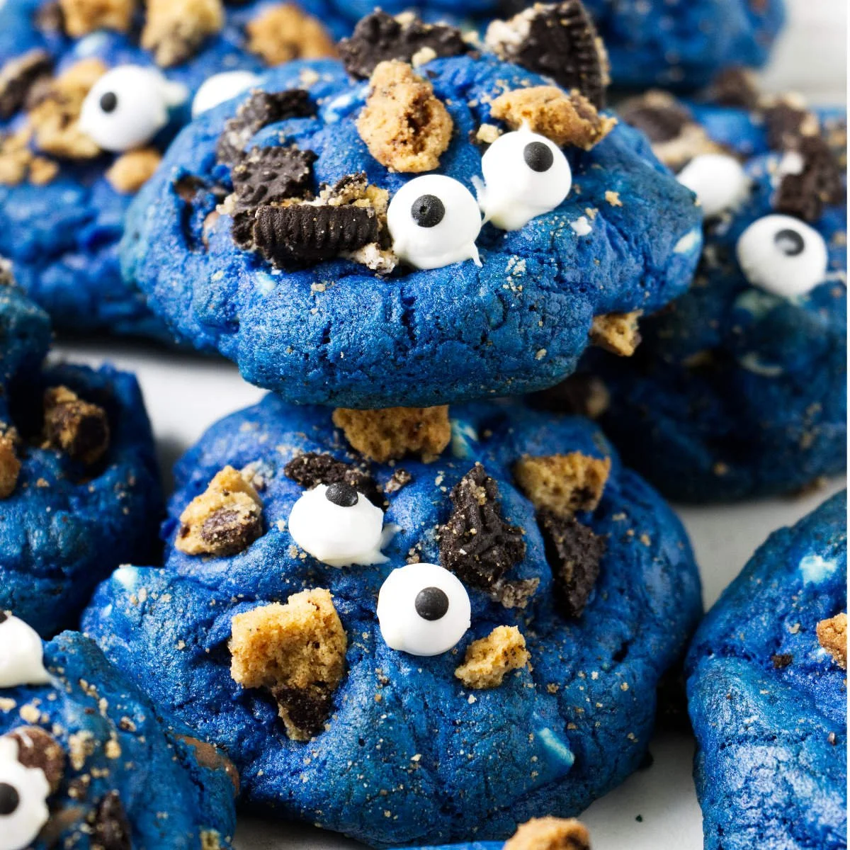 Delicious Cookie Monster cookies with vibrant blue frosting and chocolate chips